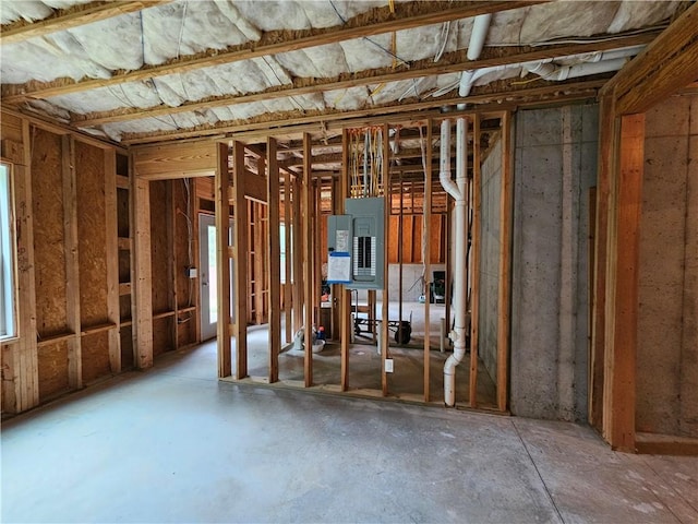 miscellaneous room featuring electric panel and plenty of natural light