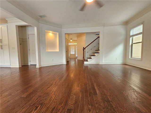 unfurnished living room with ceiling fan, ornamental molding, and dark hardwood / wood-style flooring