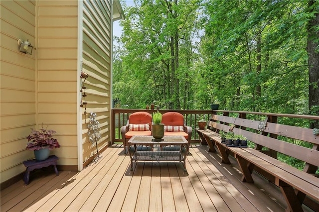 wooden deck with outdoor lounge area