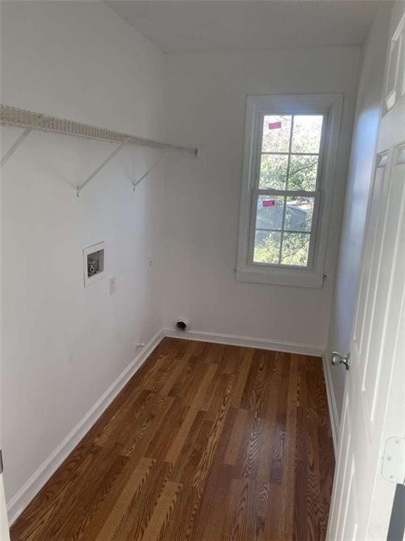 laundry room with dark wood-type flooring and washer hookup