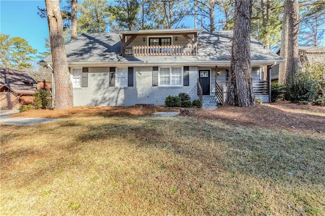 3225 Redona Dr, Atlanta, GA 30349 - view of front of home featuring a front yard and a balcony