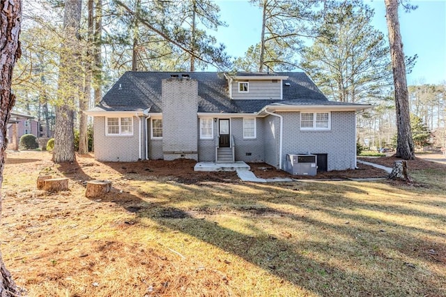 3225 Redona Dr, Atlanta, GA 30349 - view of front of house with a front lawn and central air condition unit