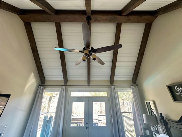 room details with french doors, beam ceiling, wood ceiling, and ceiling fan