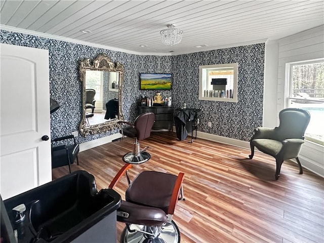 interior space featuring ornamental molding, wood-type flooring, and wooden ceiling