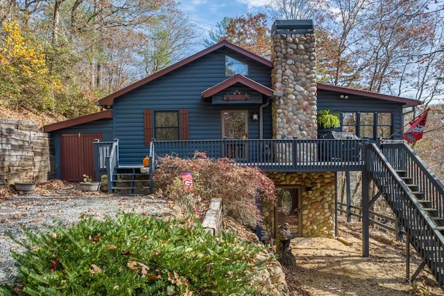 view of front of home featuring a wooden deck