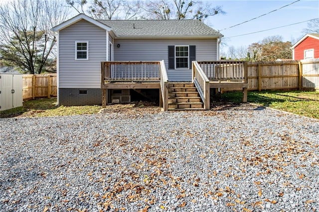 rear view of property with a deck