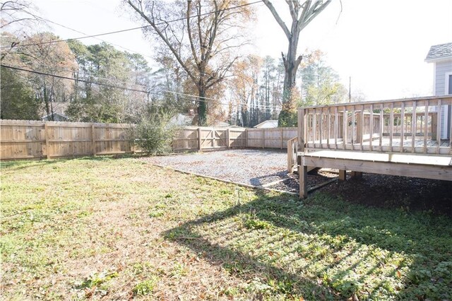 view of yard featuring a deck