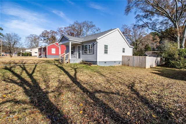 exterior space featuring a front lawn