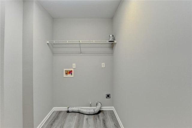 washroom featuring laundry area, washer hookup, hookup for an electric dryer, and wood finished floors