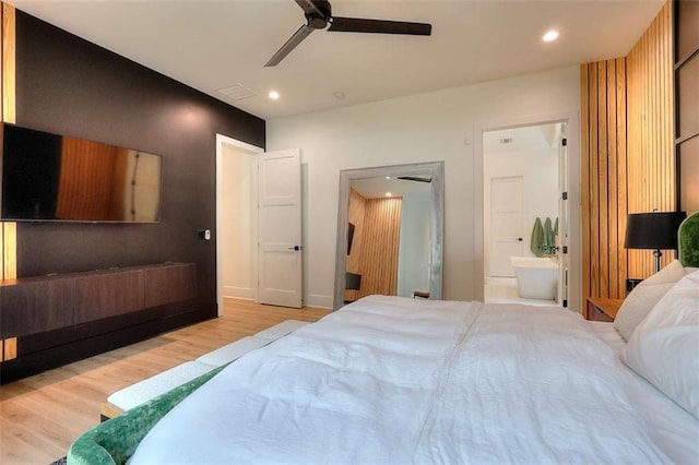 3960 Stock Rd, Monroe, GA 30656 - bedroom with light wood-type flooring, recessed lighting, ensuite bathroom, and ceiling fan
