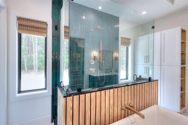 3960 Stock Rd, Monroe, GA 30656 - bathroom with a freestanding tub and a tile shower