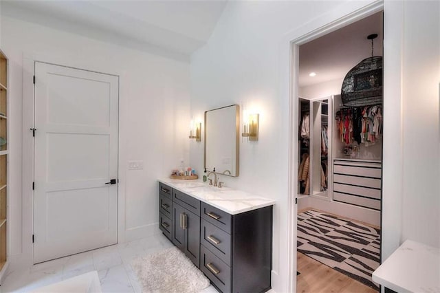 3960 Stock Rd, Monroe, GA 30656 - bathroom featuring vanity and a spacious closet
