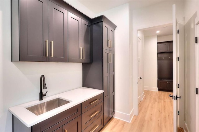 3960 Stock Rd, Monroe, GA 30656 - kitchen featuring light wood-type flooring, light countertops, and recessed lighting