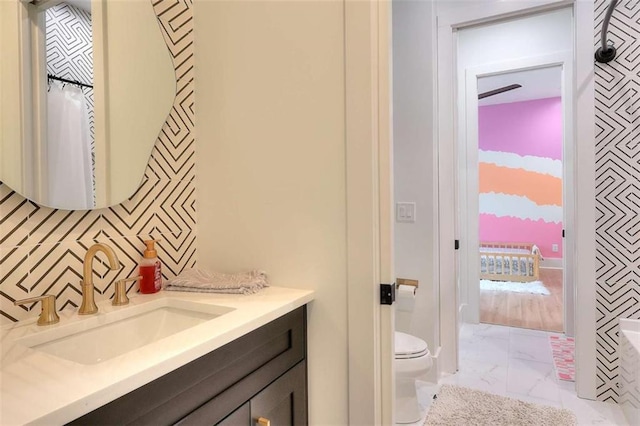 3960 Stock Rd, Monroe, GA 30656 - full bath featuring marble finish floors, vanity, and backsplash