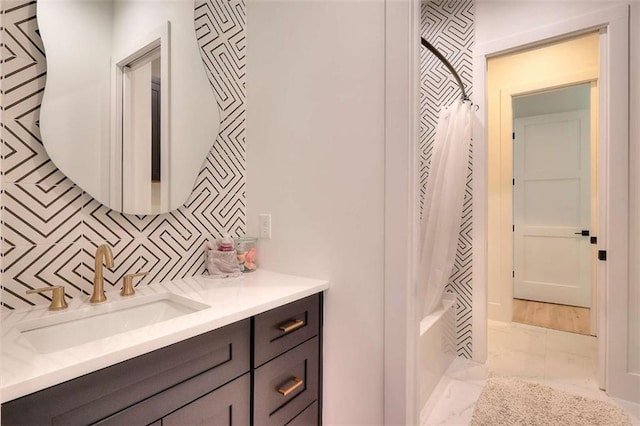3960 Stock Rd, Monroe, GA 30656 - full bathroom featuring marble look tile flooring, vanity, and shower / bath combination with curtain