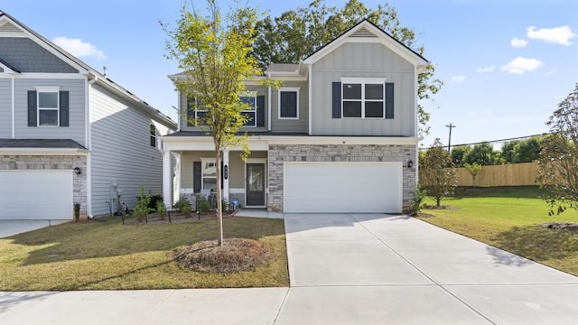 305 Knights Ct, Canton, GA 30115 - craftsman-style house with board and batten siding, stone siding, an attached garage, fence, and a front lawn