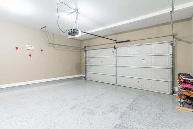 305 Knights Ct, Canton, GA 30115 - garage featuring a garage door opener and baseboards