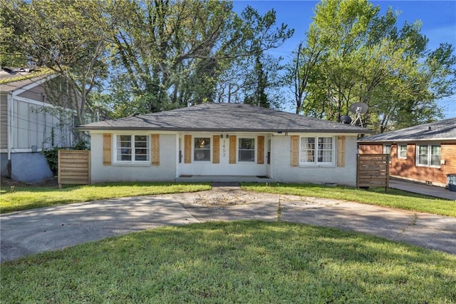 1452 Mercer Ave, Atlanta, GA 30337 - single story home featuring brick siding, driveway, and a front yard
