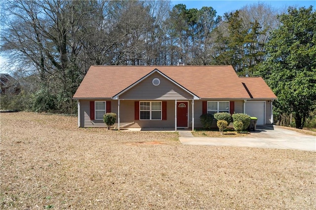 131 Tye St, Stockbridge, GA 30281 - ranch-style home with a garage, driveway, covered porch, and a front yard