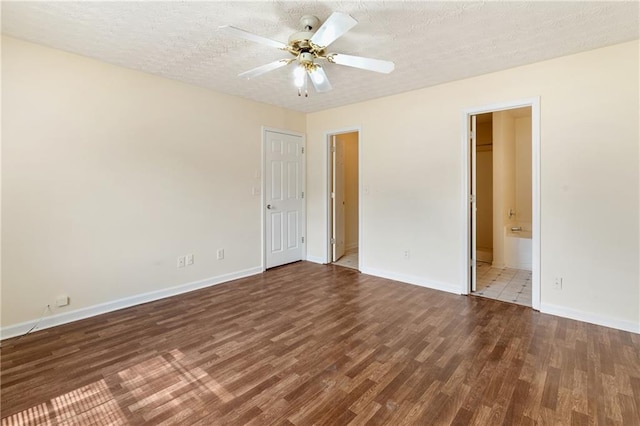 131 Tye St, Stockbridge, GA 30281 - unfurnished room featuring wood finished floors, baseboards, a textured ceiling, and a ceiling fan
