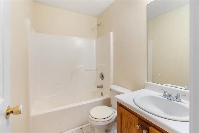 131 Tye St, Stockbridge, GA 30281 - full bath with toilet, vanity,  shower combination, tile patterned flooring, and a textured ceiling