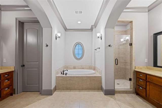 bathroom with tile patterned flooring, vanity, shower with separate bathtub, and crown molding