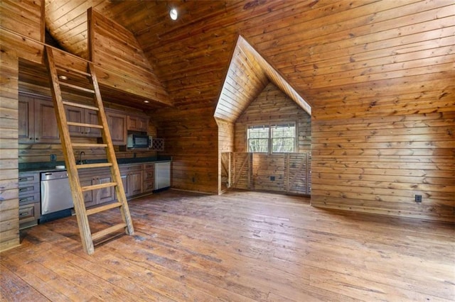 bonus room with dark wood-type flooring, vaulted ceiling, wooden walls, and wood ceiling