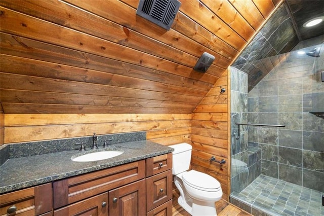 bathroom featuring wooden ceiling, lofted ceiling, toilet, a shower with shower door, and wood walls