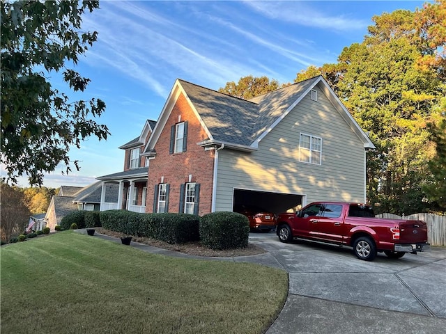 view of property exterior with a garage, a lawn, concrete driveway, fence, and brick siding