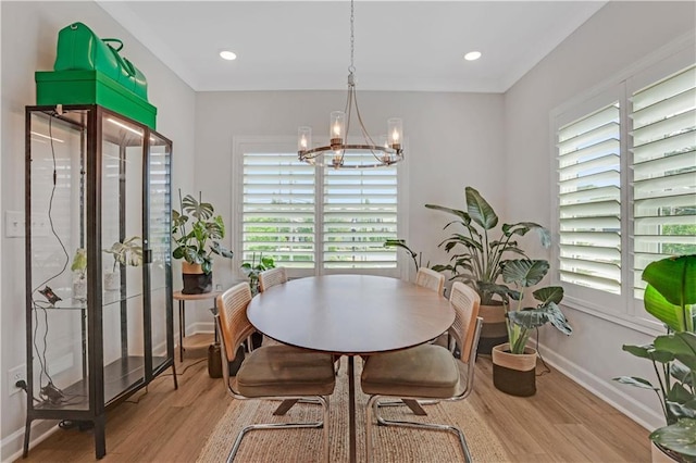 1768 Evenstad Way, Smyrna, GA 30080 - dining space featuring wood finished floors, a chandelier, healthy amount of natural light, and recessed lighting
