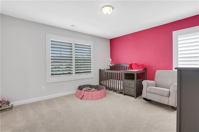 1768 Evenstad Way, Smyrna, GA 30080 - carpeted bedroom with baseboards, multiple windows, and a crib