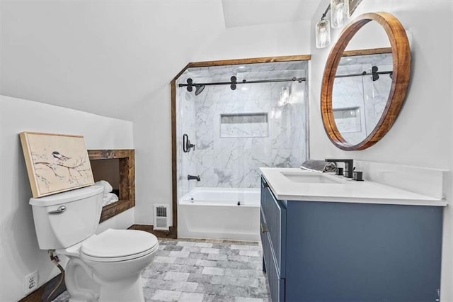 full bathroom with toilet, tiled shower / bath combo, and vanity