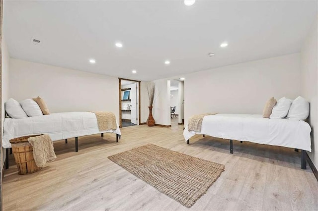 bedroom featuring light hardwood / wood-style flooring