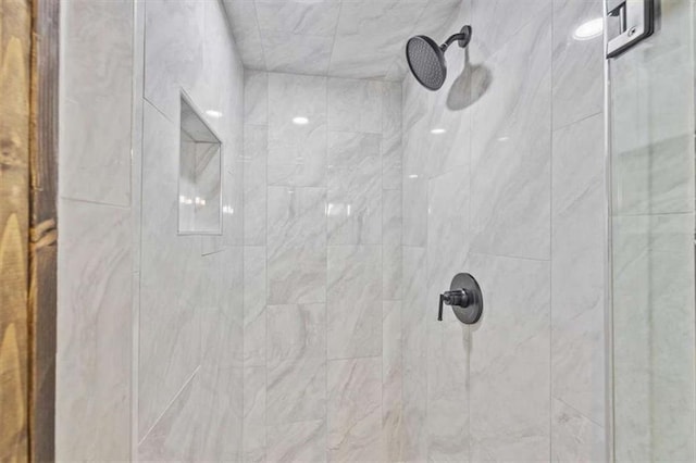 room details with a tile shower