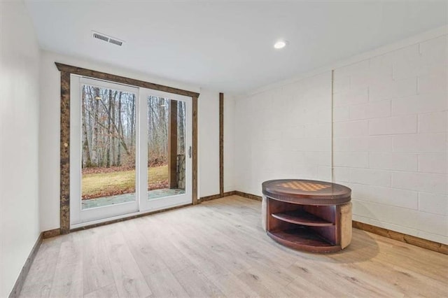 empty room featuring hardwood / wood-style flooring