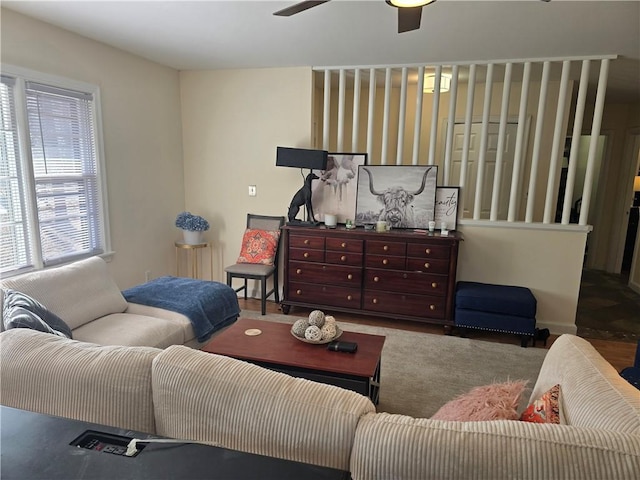 living area featuring ceiling fan