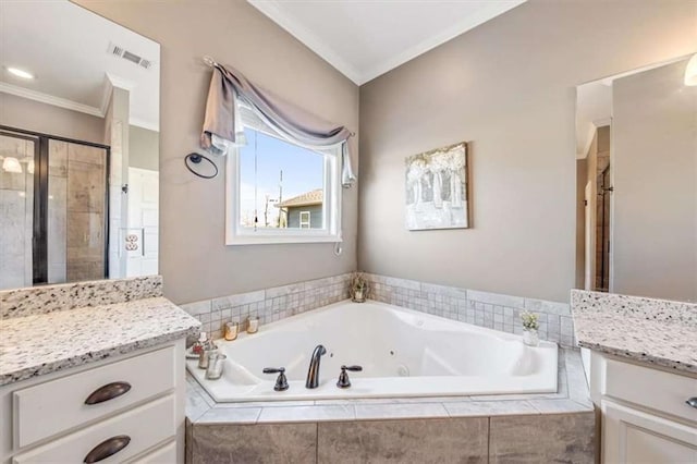 full bathroom featuring vanity, visible vents, a stall shower, and ornamental molding