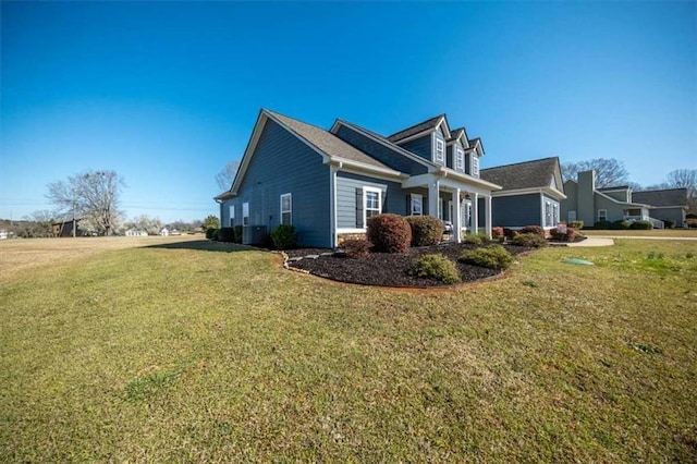 view of property exterior with a lawn