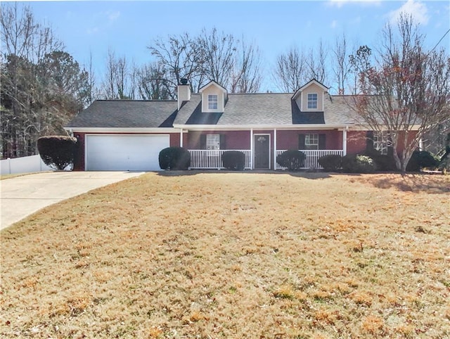 cape cod home featuring brick siding, covered porch, concrete driveway, a front yard, and a garage