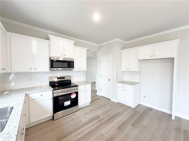 kitchen featuring light wood finished floors, appliances with stainless steel finishes, crown molding, and light stone countertops