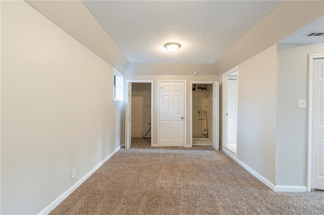 interior space with a textured ceiling