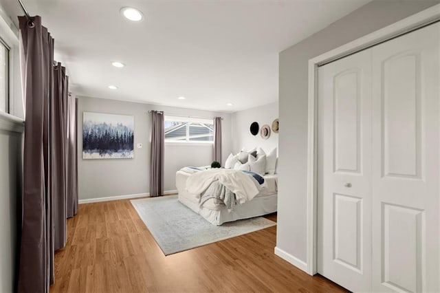 bedroom with light hardwood / wood-style floors