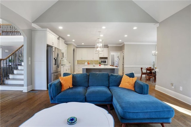 living room with stairway, arched walkways, baseboards, and dark wood-style floors