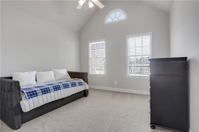 bedroom with multiple windows, carpet floors, baseboards, and a ceiling fan