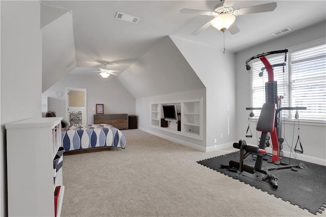 bedroom with visible vents, baseboards, lofted ceiling, and carpet