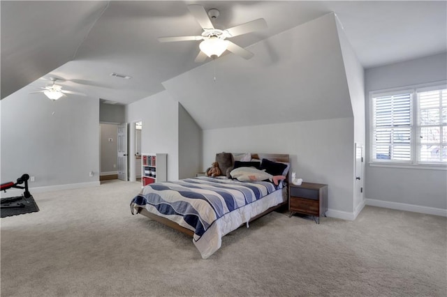 bedroom featuring lofted ceiling, baseboards, visible vents, and carpet floors