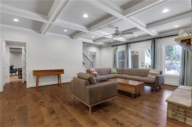 living area with beamed ceiling, baseboards, coffered ceiling, and dark wood finished floors