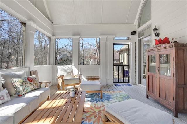 sunroom with lofted ceiling