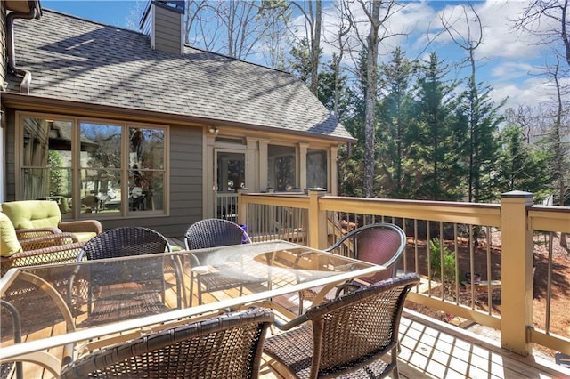 deck with outdoor dining space