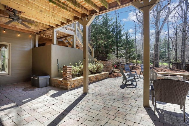 view of patio featuring stairway